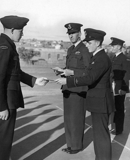 Sq/Ldr F.C. Penny at presentation of proficiency certificates to RAAF ATC cadets, c1942. Photograph courtesy State Library Victoria
